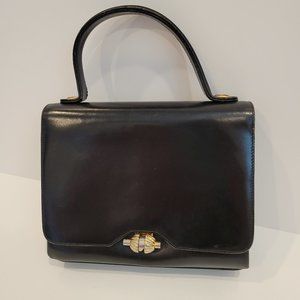Koret - black calf-skin leather handbag with gold-toned closure
